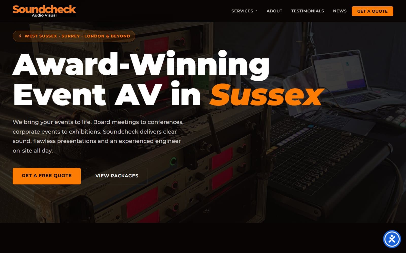 The Soundcheck Audio Visual brand in use on the website, with the orange wordmark over a darkened photo of sound equipment